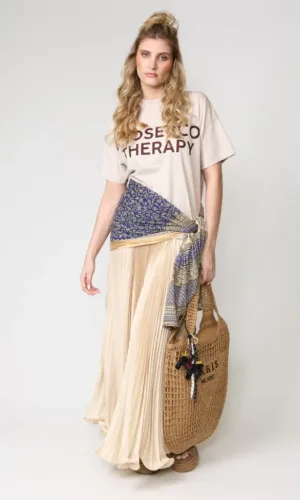 Polera oversized y falda plisada