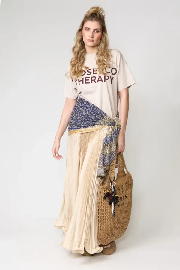 Polera oversized y falda plisada